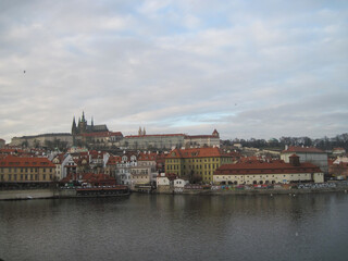 Naklejka na ściany i meble Scenic landscape of Prague on a cloudy day