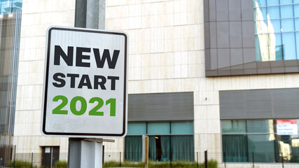 New start 2021 sign in a downtown city setting