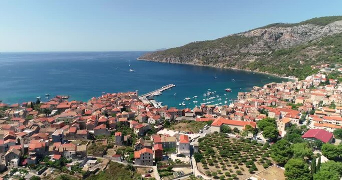 Aerial view of the winding roads to the town of Komiza on the island of Vis, Dalmatia, Croatia.