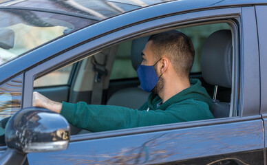 health protection, safety and pandemic concept,taxi driver on his car