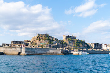 Fototapeta na wymiar 長崎県にある人気の観光スポット「軍艦島（端島）」の写真。