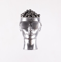 silver mannequin head isolated on white background