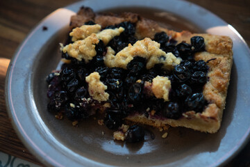 Black currant pie on a baking sheet, shortcrust pastry, low key