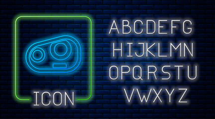 Glowing neon Car headlight icon isolated on brick wall background. Neon light alphabet. Vector.