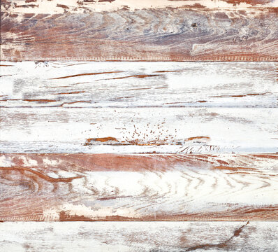 The texture of a light wood surface with weathered scuffs of plaster, paint and horizontal grains.