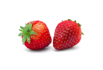 Fresh red ripe strawberries with leaf isolated on white background.