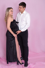 A beautiful and happy couple expecting a baby.