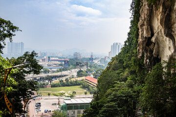 Obraz premium a view of a high rocky green mountain with a gold status