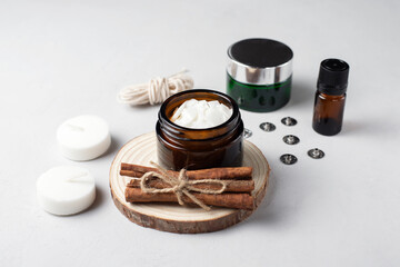 Basic set for home-made natural white eco soy wax candles in glass, wick, perfume. Idea for a hobby, business. Making trendy diy candles without harm to health on white background. 