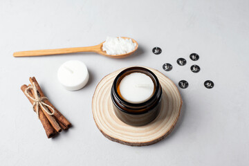 Basic set for home-made natural white eco soy wax candles in glass, wick, perfume. Idea for a hobby, business. Making trendy diy candles without harm to health on white background. 