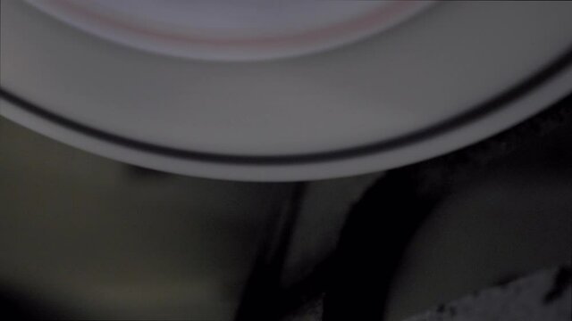 Close Up POV shot of Sharpening Stone hitting Skate Balde with Sparks flying off