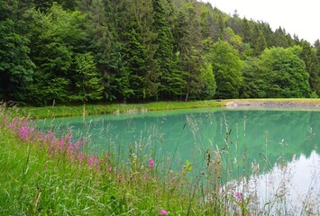 artificial blue lake called tajch surrounded by green forest,  Banská Štiavnica
