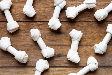 dog bone on old wooden table, dog food concept