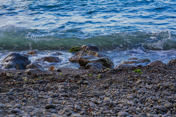 Small waves closeup on a dawn, seascape