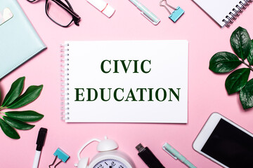 CIVIC EDUCATION is written in a white notebook on a pink background surrounded by business...