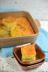 Traditional baked sweet coconut cassava cake. Selective focus
