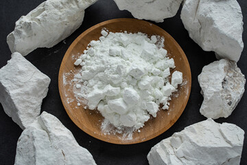 A dish of moisture-absorbing lime powder and quicklime
