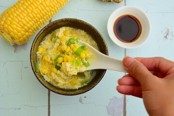 Corn egg drop soup with spring onions