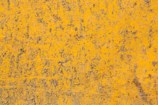 Gelber schmutziger und rostiger metallener Hintergrund