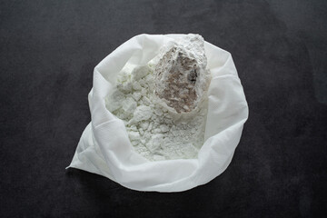 A bag of moisture-absorbing lime powder