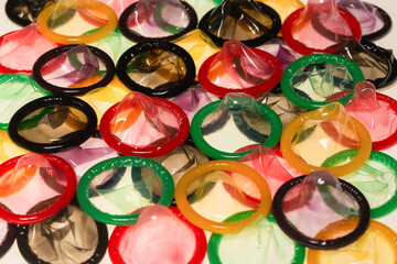 Colorful condoms background.