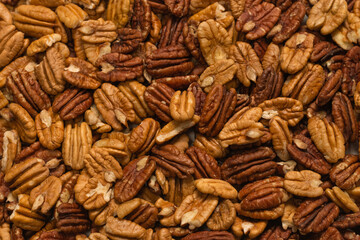 Tasty pecan-nut background. Top view.