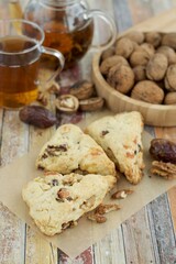 Homemade walnut date scones served with hot tea