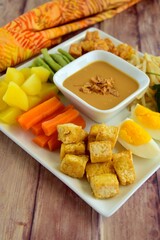 Traditional Indonesian Food, Gado-gado. Made from boiled vegetable, egg, tempeh and fried tofu served with peanut sauce