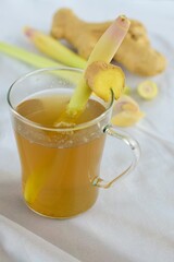 Traditional Indonesian drink, ginger lemongrass tea on white background