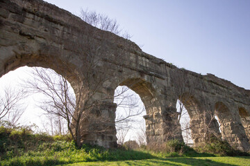 Fototapeta na wymiar The Romans networks of aqueduct monumental bridges.Water bridges are bridges constructed to convey watercourses across gaps such as valleys or ravines