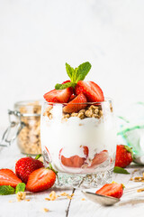 Greek yogurt with fresh strawberry and granola. Parfait.
