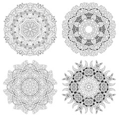 Hand drawn zentangle set of 4 mandalas for coloring page.