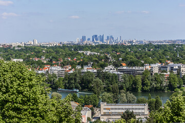 Beautiful view of valley of Seine River and panorama of Paris on backgrounds from lookout in city Saint-Germain-en-Laye (13 miles west of Paris). Saint-Germain-en-Laye, France.