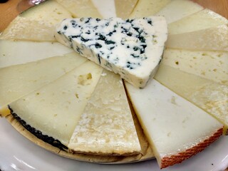 Different types of Spanish cheeses on a plate, Asturias, Spain