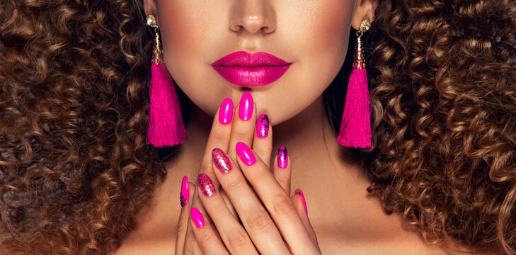 Luxury fashion style, manicure pink nail , cosmetics and make-up . Jewelry , large Fuchsia tassels  earrings	