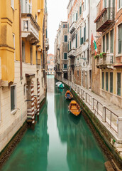 Fototapeta na wymiar Typical view of a canal in Venice