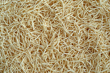 Thin egg noodles for broth background texture