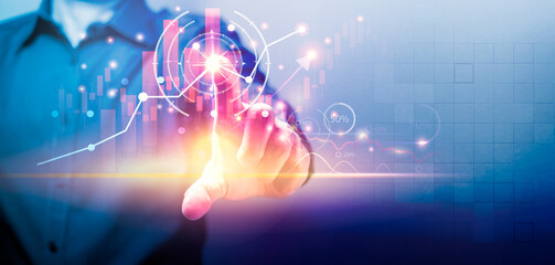 Businessman touching on progress of business growth graph and analyzing financial data. Business planning and strategy Concept