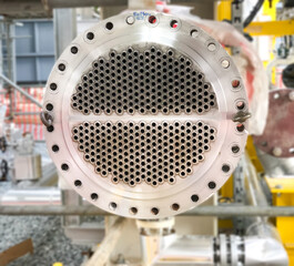 Power plant heat exchanger and is on a blurred background.