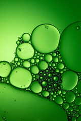 air bubbles in liquid green tone background