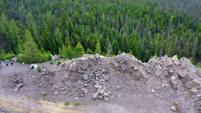 Aerial Panning Shot Of Tourists Camping With Vehicles Amidst Trees, Drone Flying Over National Park - Crater Lake National Park, Oregon