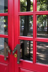 Closed restaurant in the old town. Red doors, entrance to the room