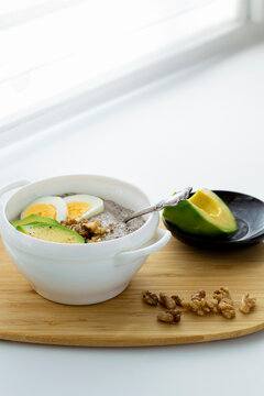 Flaxseed Porridge With Avocado And Egg. Detox Breakfast. Healthy Anti-age Porridge