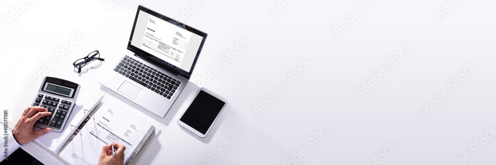 Poster high angle view of businessperson calculating invoice