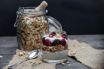 granola muesli oats yogurt berries in glass healthy snack