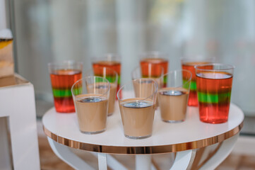 Sweet cakes at a wedding banquet. Catering, sweet festive buffet. Candy bar