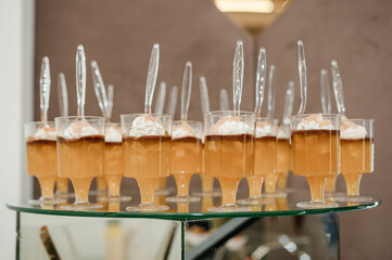 Sweet cakes at a wedding banquet. Catering, sweet festive buffet. Candy bar