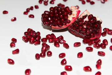 Garnet seeds on white background