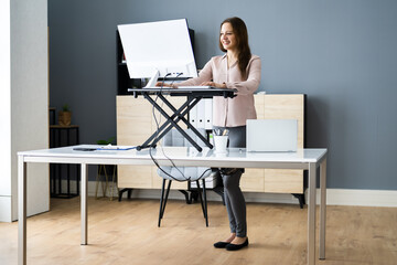 Adjustable Height Desk Stand In Office