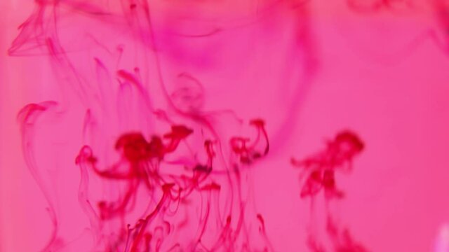 Abstract red texture, Blood in water,  liquid painting, is an amazing organic background for visual effects and motion graphics